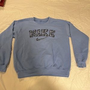 Blue butterfly Nike sweatshirt